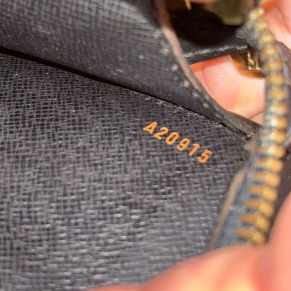 Authentic Louis Vuitton black leather clutch - Picture 8 of 8